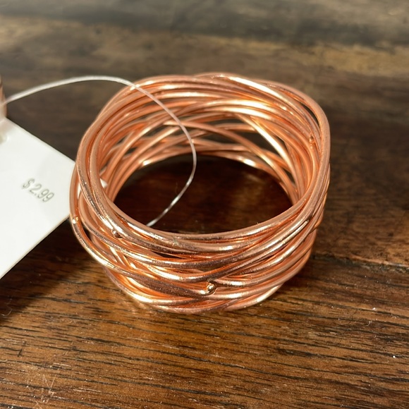 Other - 8 copper napkin rings - 4 of each style hammered and wire.  Never used - India